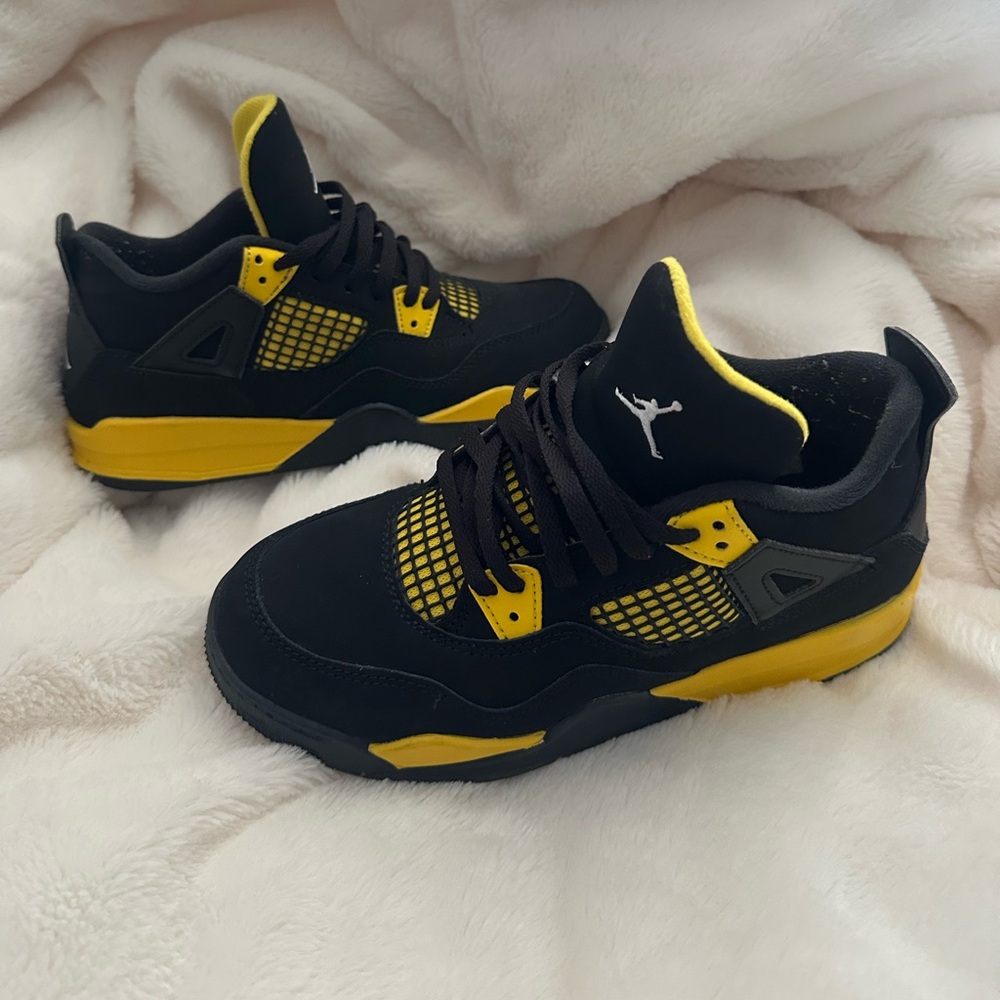 yellow and black jordan 4s